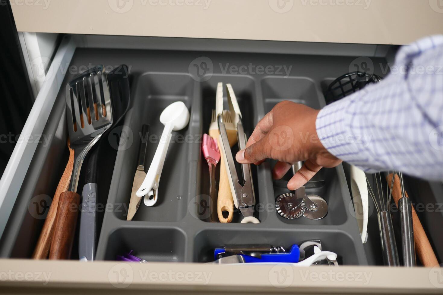 cutlery fork with knife and spoon in a drawer photo