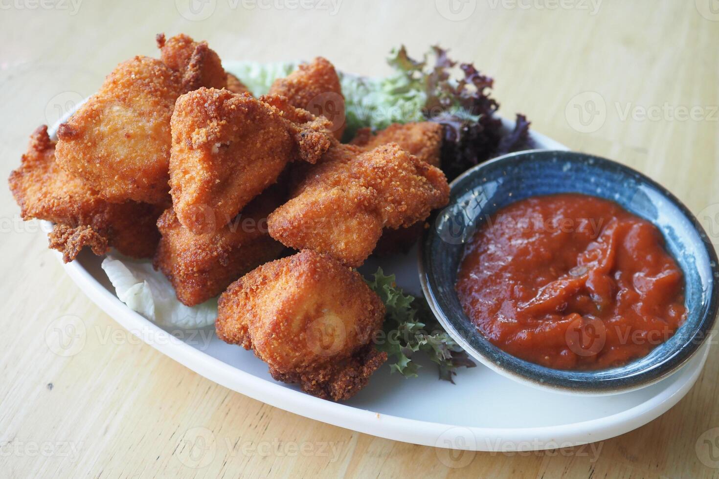 Crispy Fried Chicken Bites with Dipping Sauce, a delectable appetizer for food enthusiasts photo