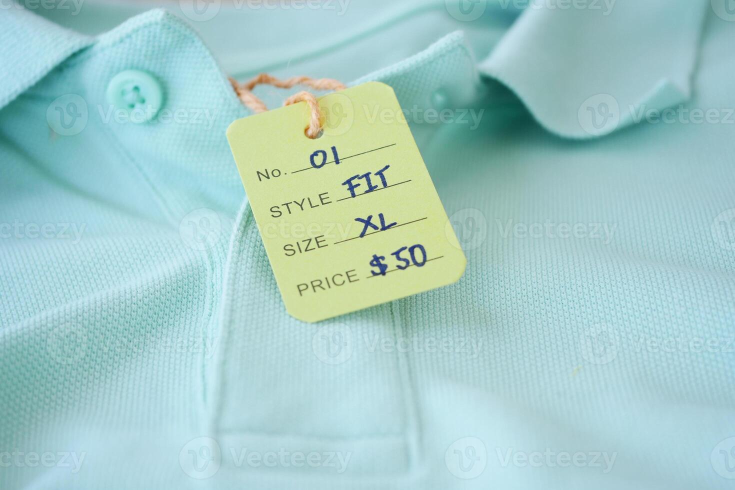 100 dollar price tag on a shirt , photo