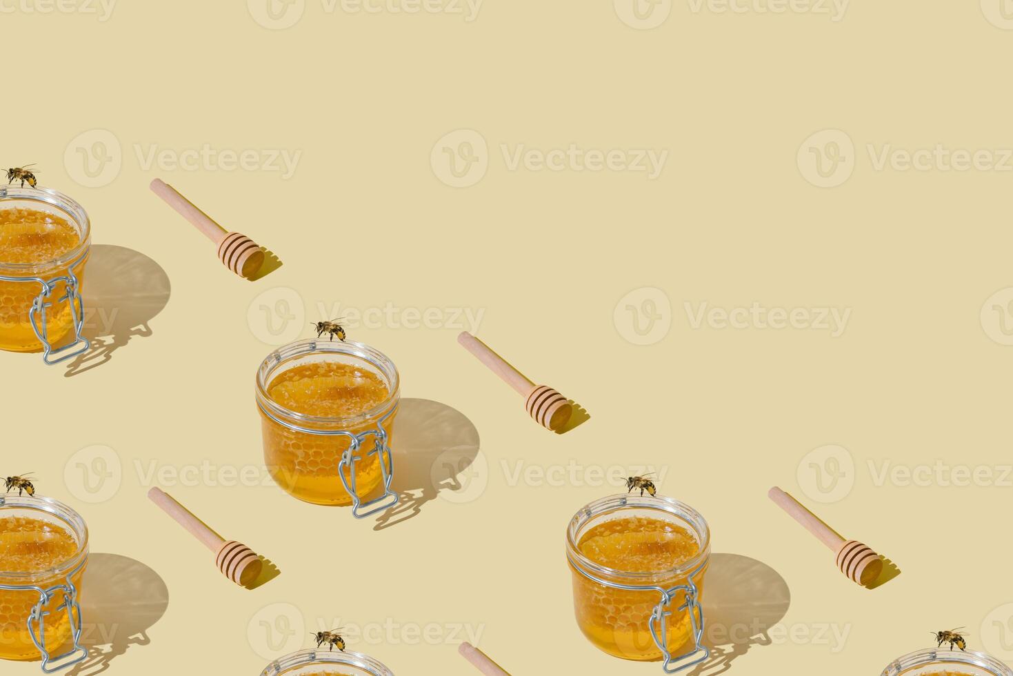 Creative pattern of jar full of natural honey and honeycombs, honey bee and honey dipper on beige background with copy space. Minimal nature concept. Healthy food idea. Honey aesthetic background. photo