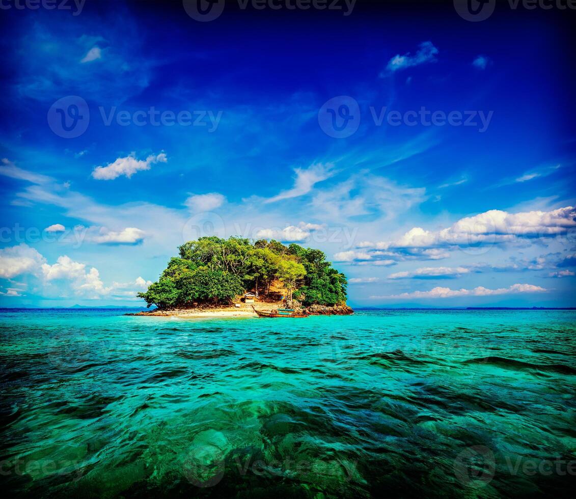 Tropical island in sea photo