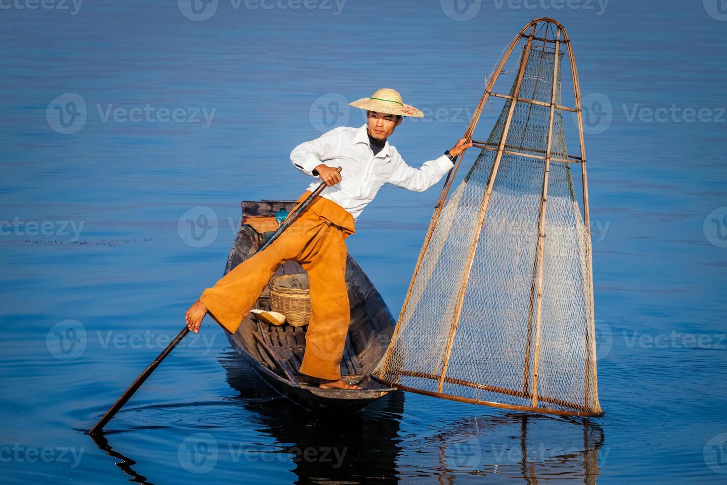 Burmese fisherman at Inle lake, Myanmar photo