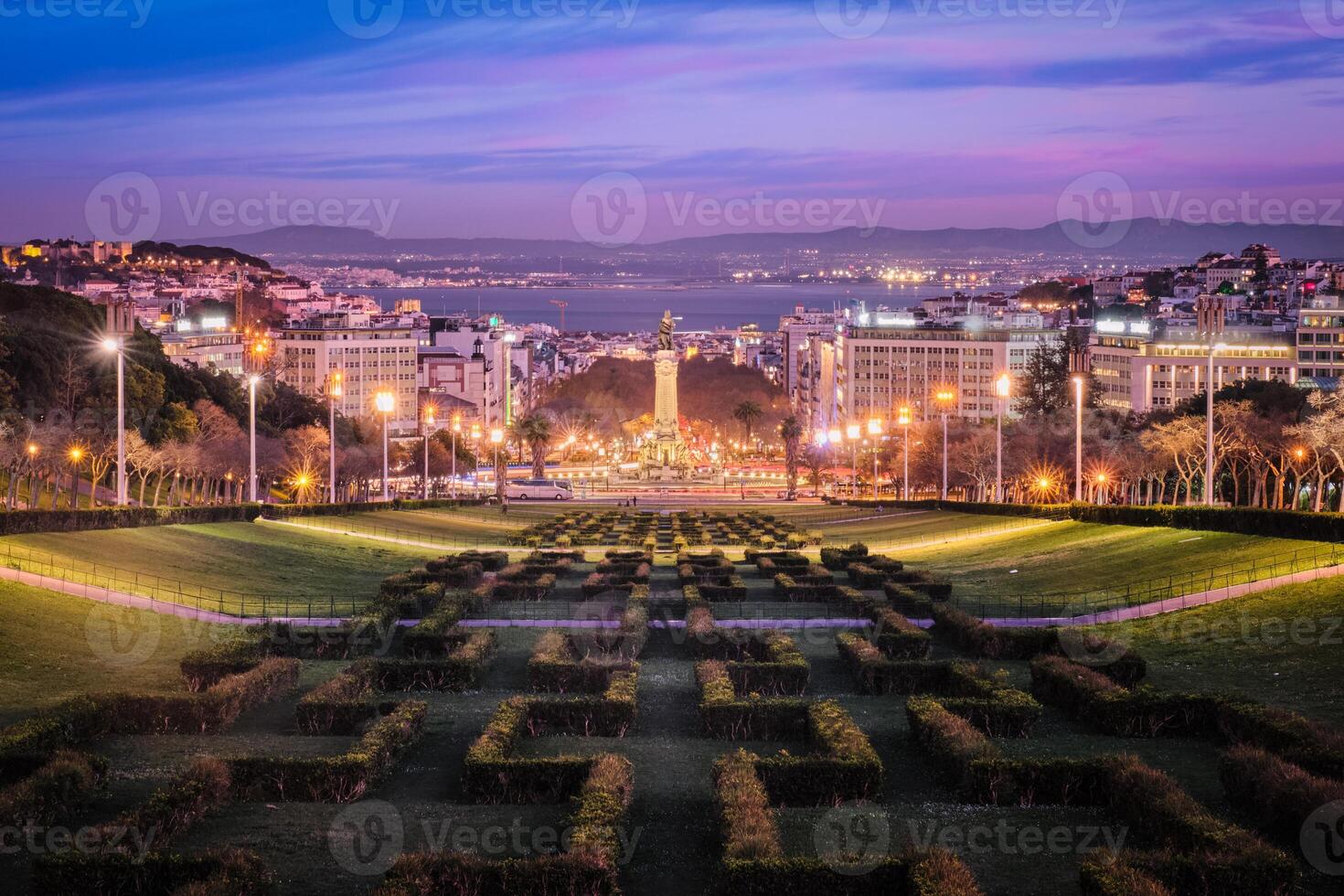 View of Lisbon Marquis of Pombal Square seen from the Eduardo VII Park in night, Portugal photo