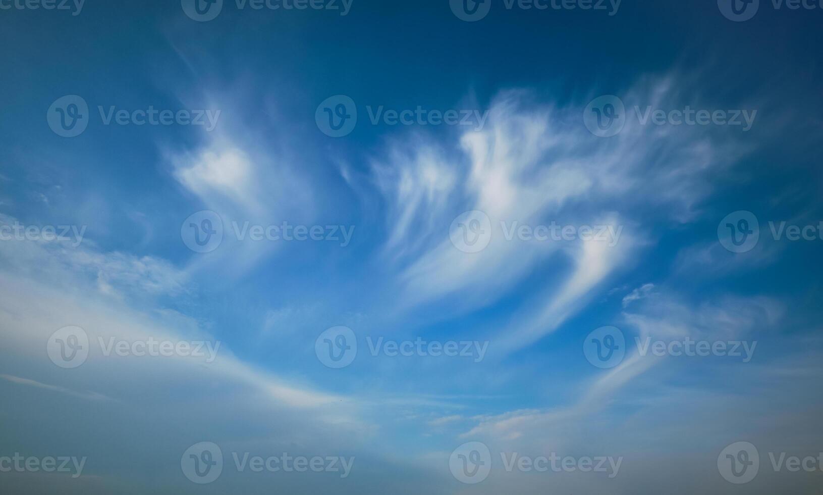 Blue sky with whie Cirrus clouds photo