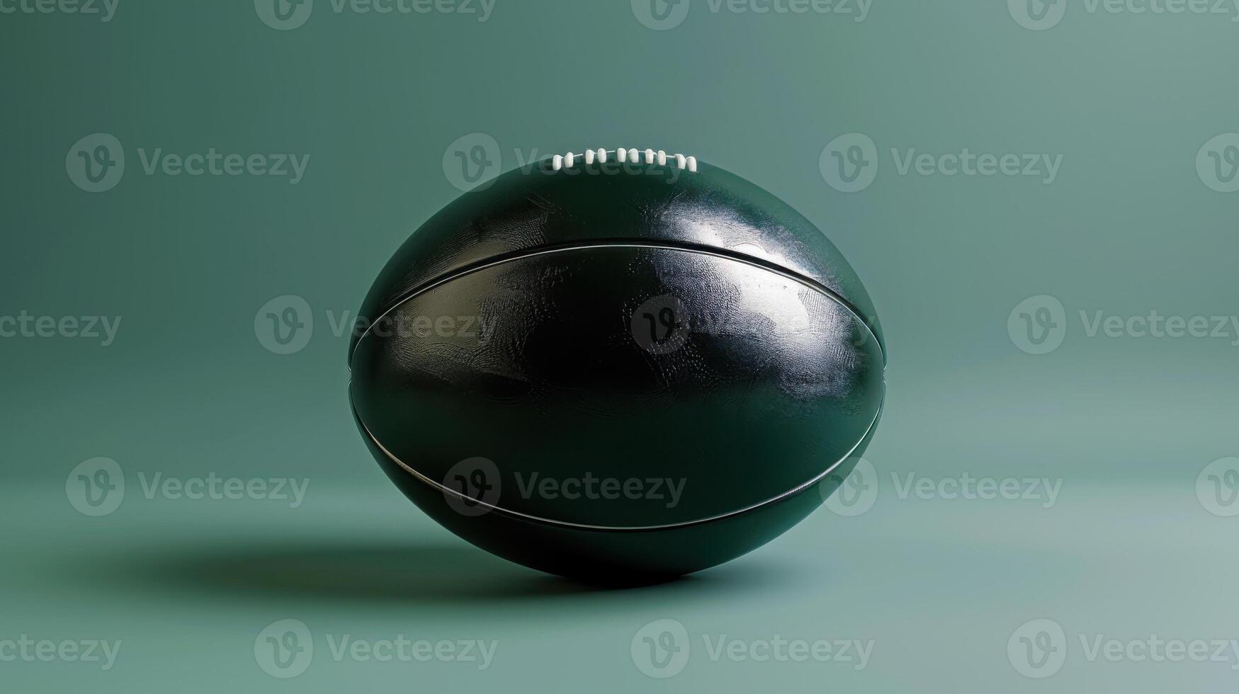 A minimalist image of a green American football, ideal for sports, simplicity, and modern design themes. photo