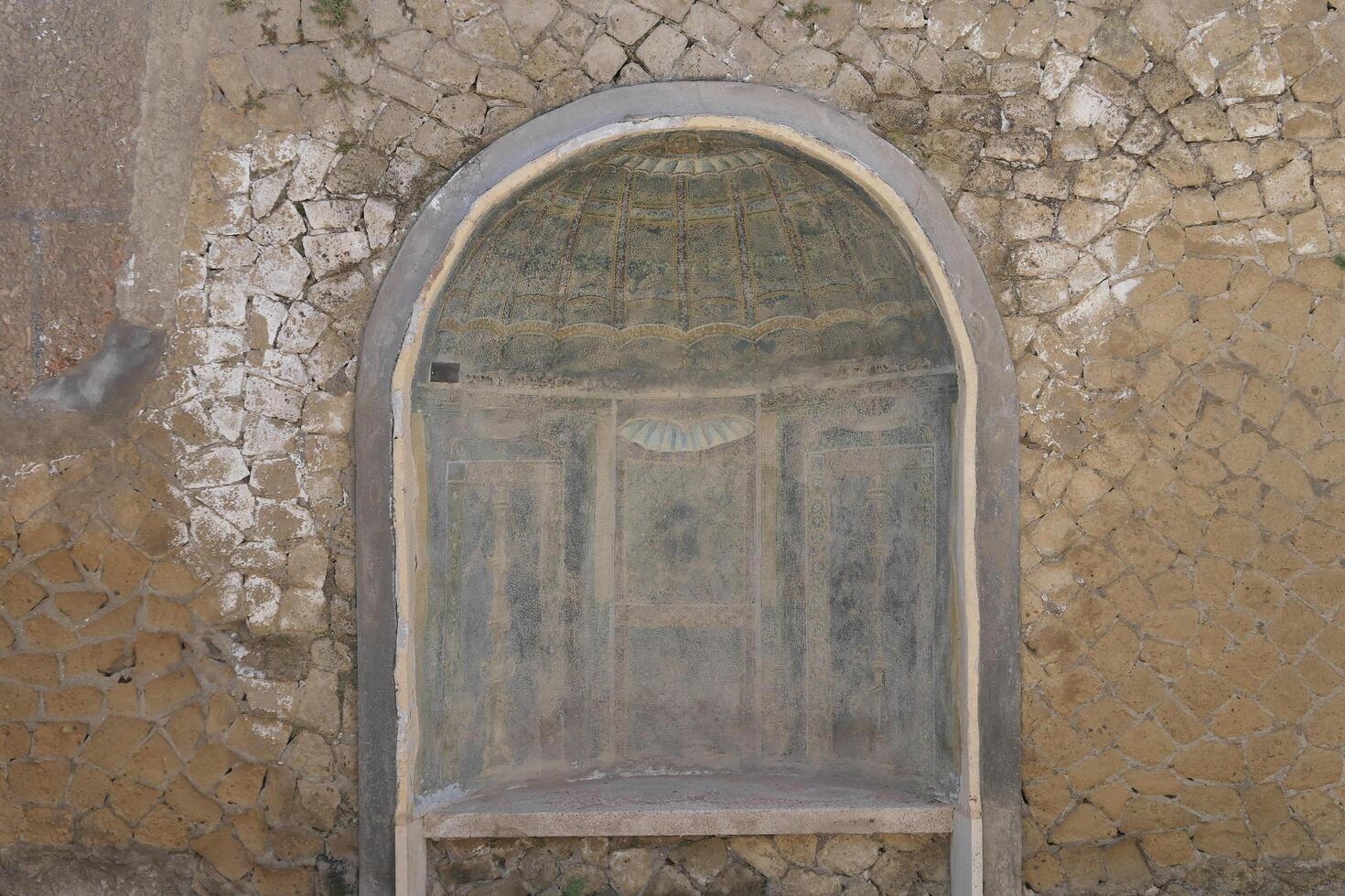Ercolano, Italy, 2024 Well preserved wall paintings inside homes and palaces of Herculaneum were protected for 2000 years under the volcanic ash and pumice from the Mount Vesuvius eruption in 79 AD.. photo