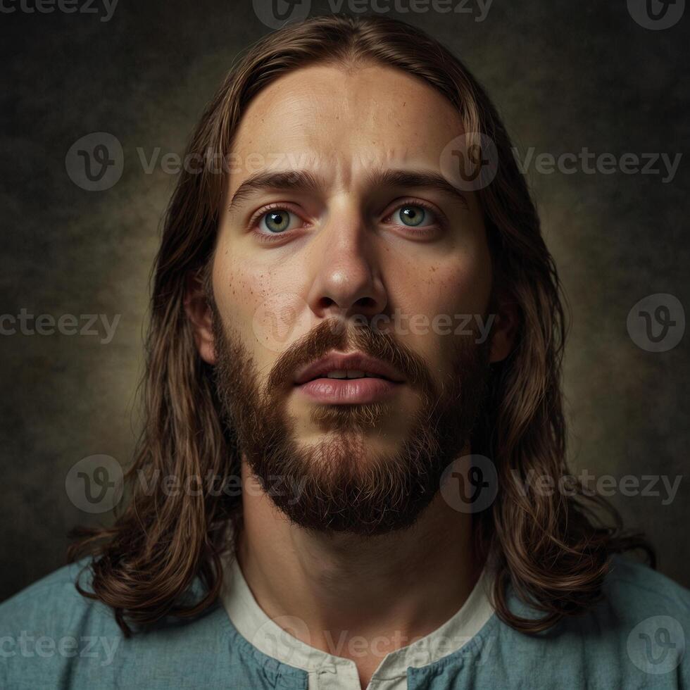 A young man with a serene and contemplative expression, reminiscent of classical depictions of religious figures. His long brown hair and full beard give him a timeless look. photo