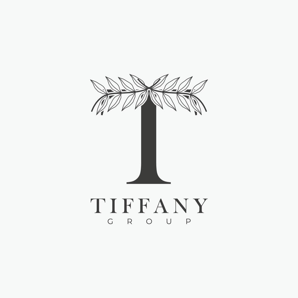 T letter logo with a creative floral concept for company business beauty real estate premium vector