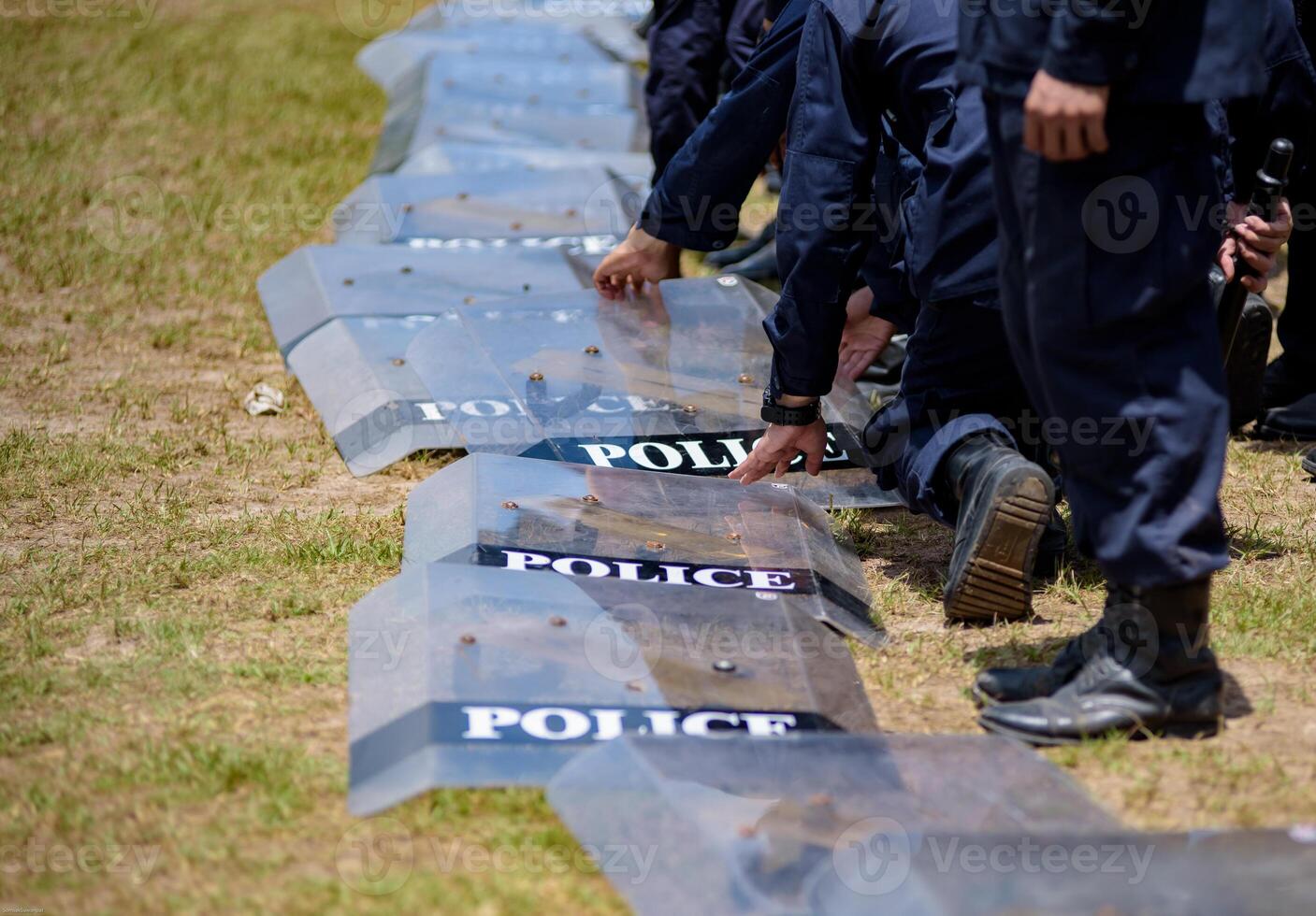Riot police control the crowd.. photo