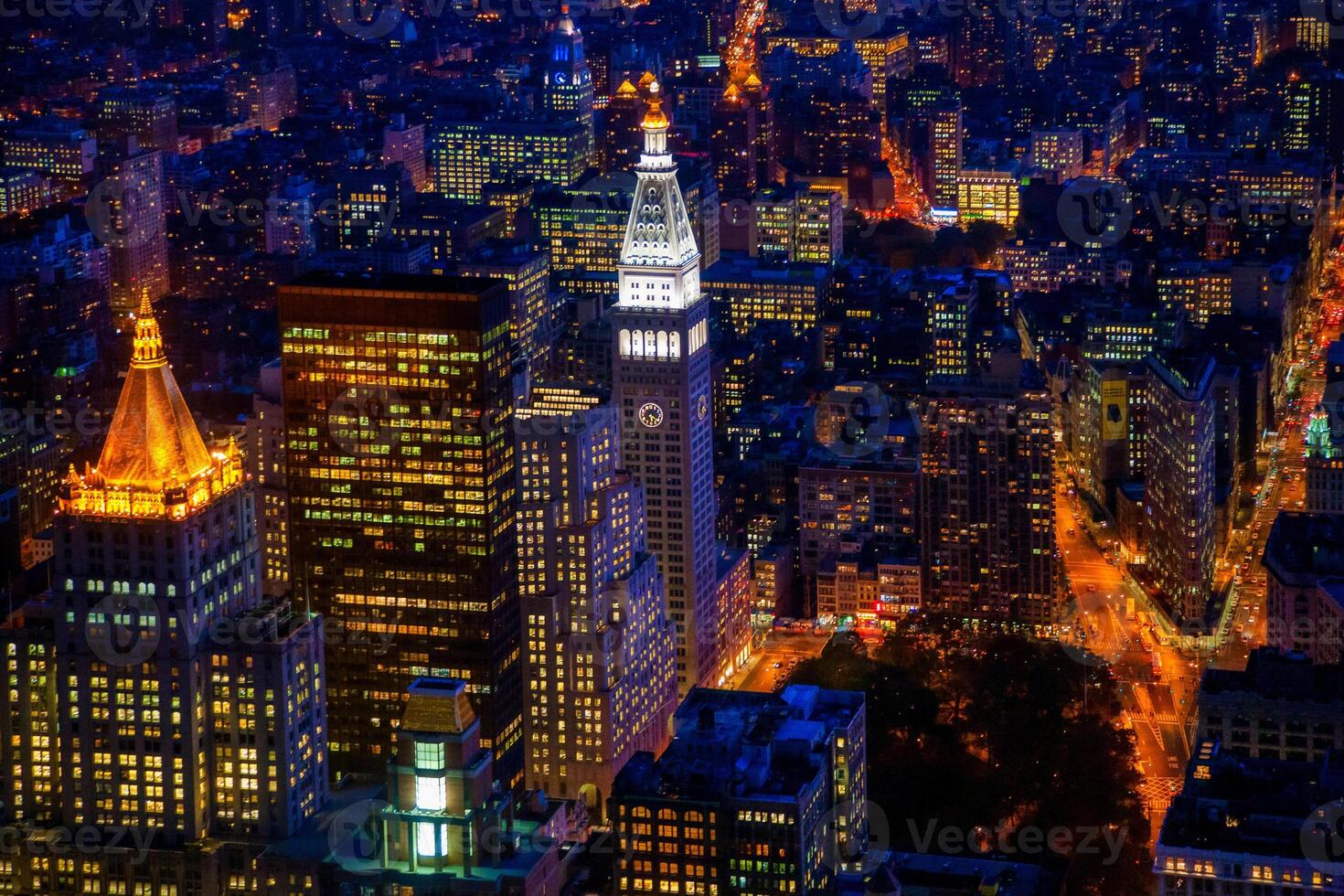 The Flatiron building and the MLIT by night from the Empire State Building, NYC, USA photo