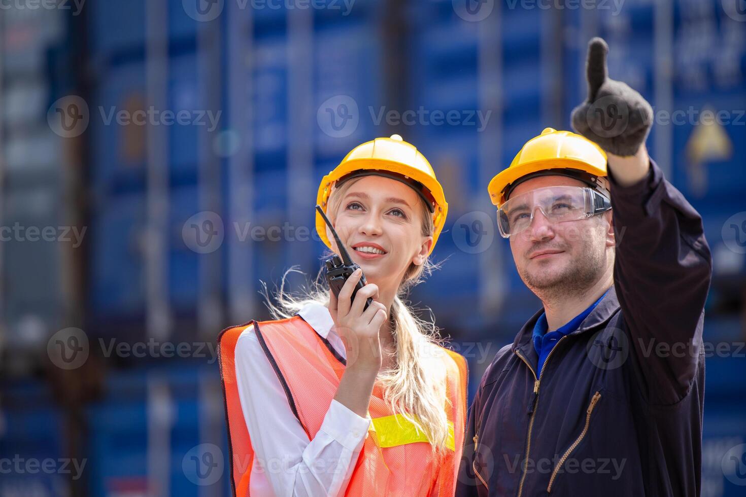 Customs worker team working in Port Cargo Shipping Container Yard together, Radio Loading Control Operate. photo