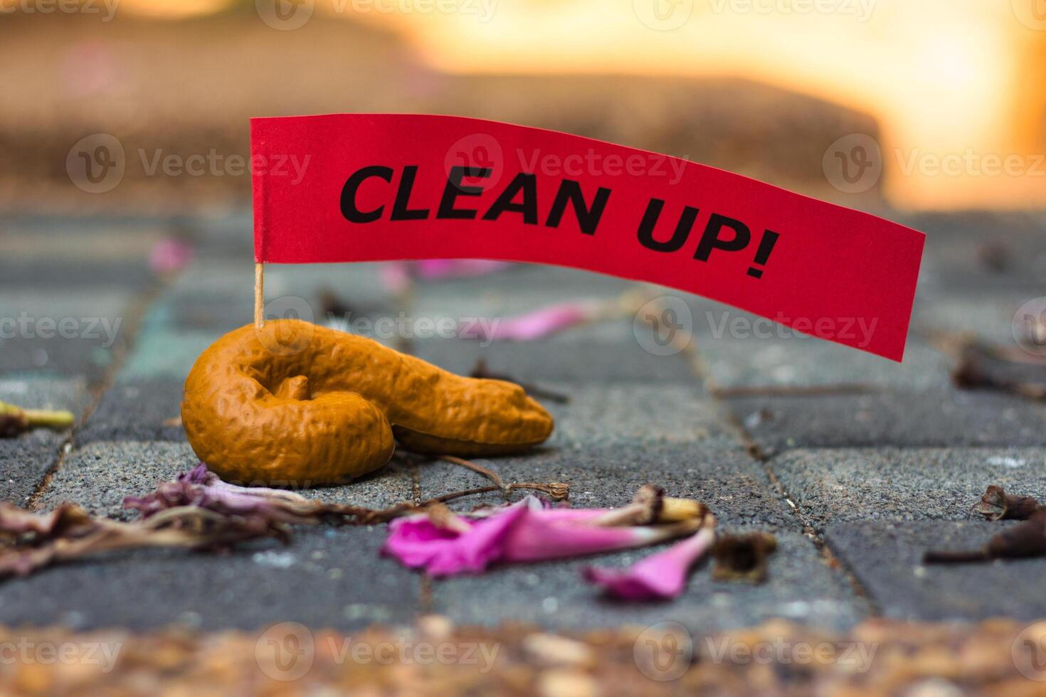 Dog feces lying on the ground after their owner didn't pick it up. photo