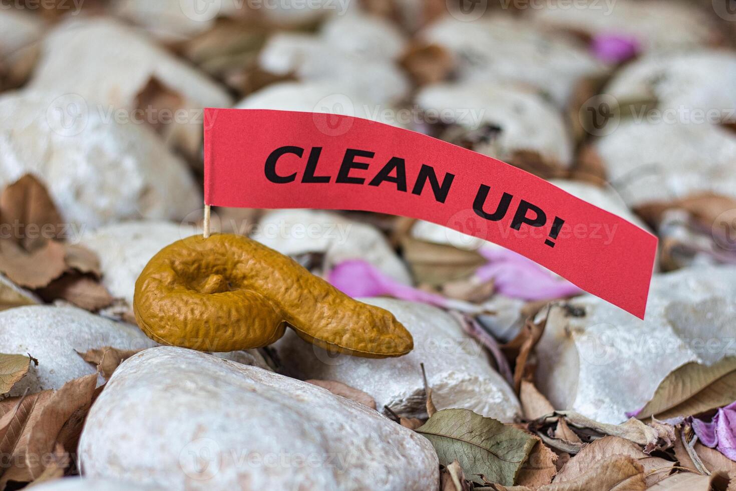 Dog feces lying on the ground after their owner didn't pick it up. photo