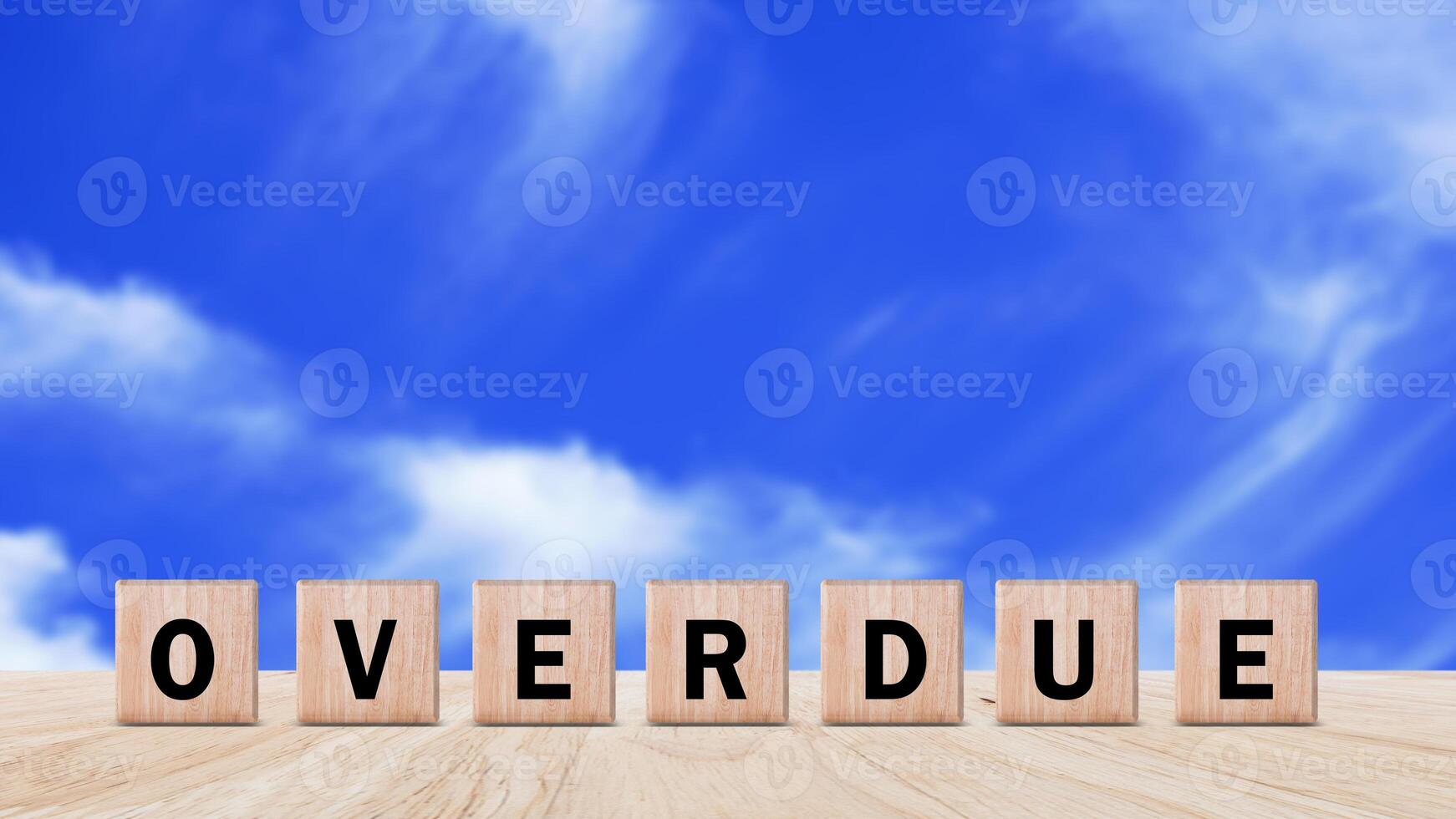 Overdue, Wooden on the office desk, informative and communication background, Word OVERDUE made with wood building blocks, OVERDUE word on block concept. photo