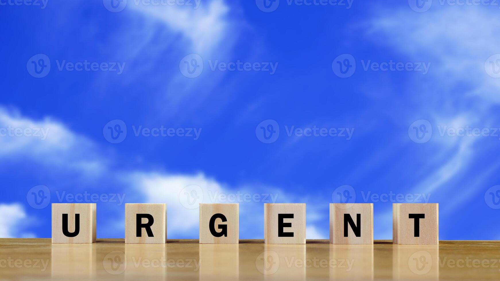 URGENT, Wooden blocks with URGENT text and Business concept, informative and communication background, Urgent Notice Important Quick Serious Speed Concept. photo