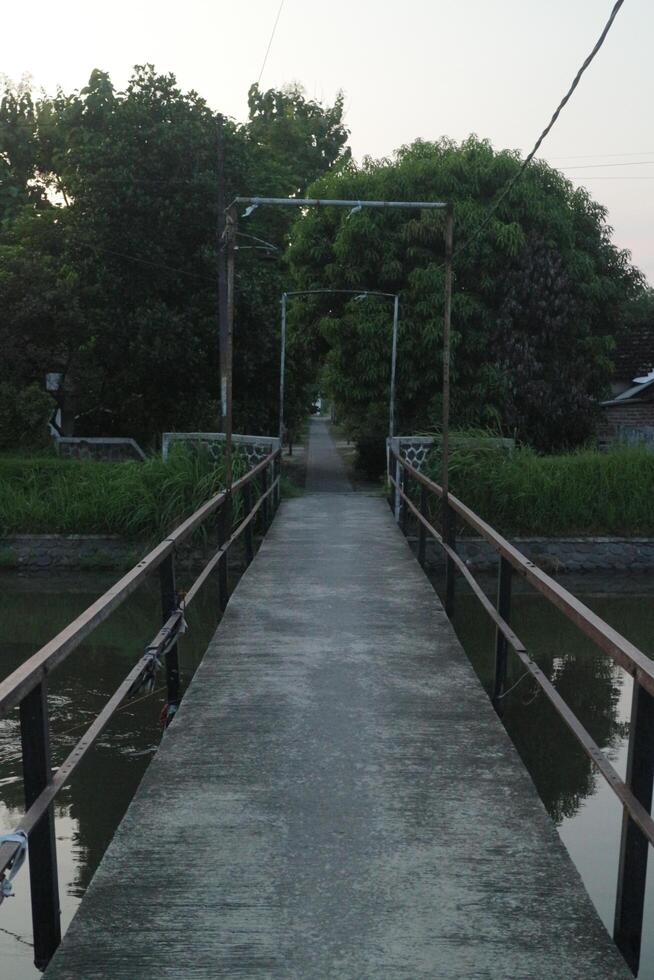 Bridge that separate village to another photo