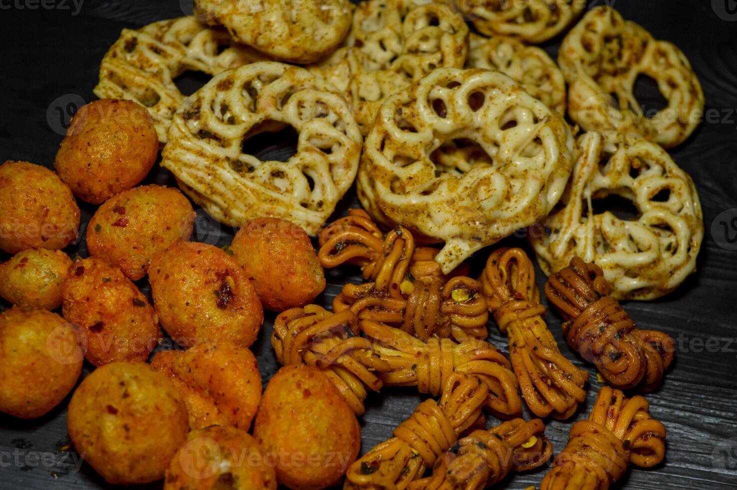 Moring or cimol kering is a typical Garut snack made from wheat flour and tapioca sprinkled with powdered spices. There are spicy, cheesy and original flavors. photo