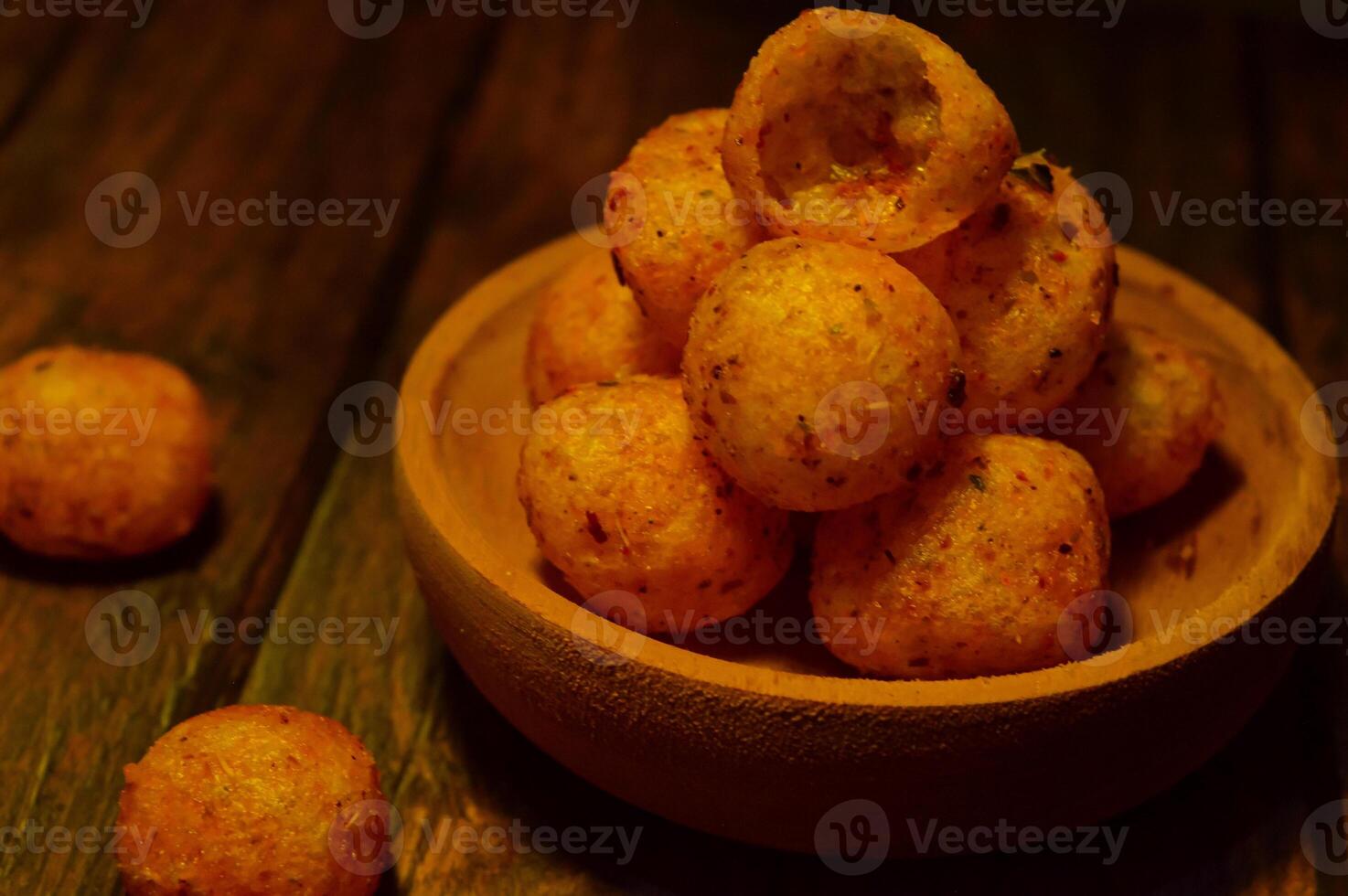 Moring or cimol kering is a typical Garut snack made from wheat flour and tapioca sprinkled with powdered spices. There are spicy, cheesy and original flavors. photo