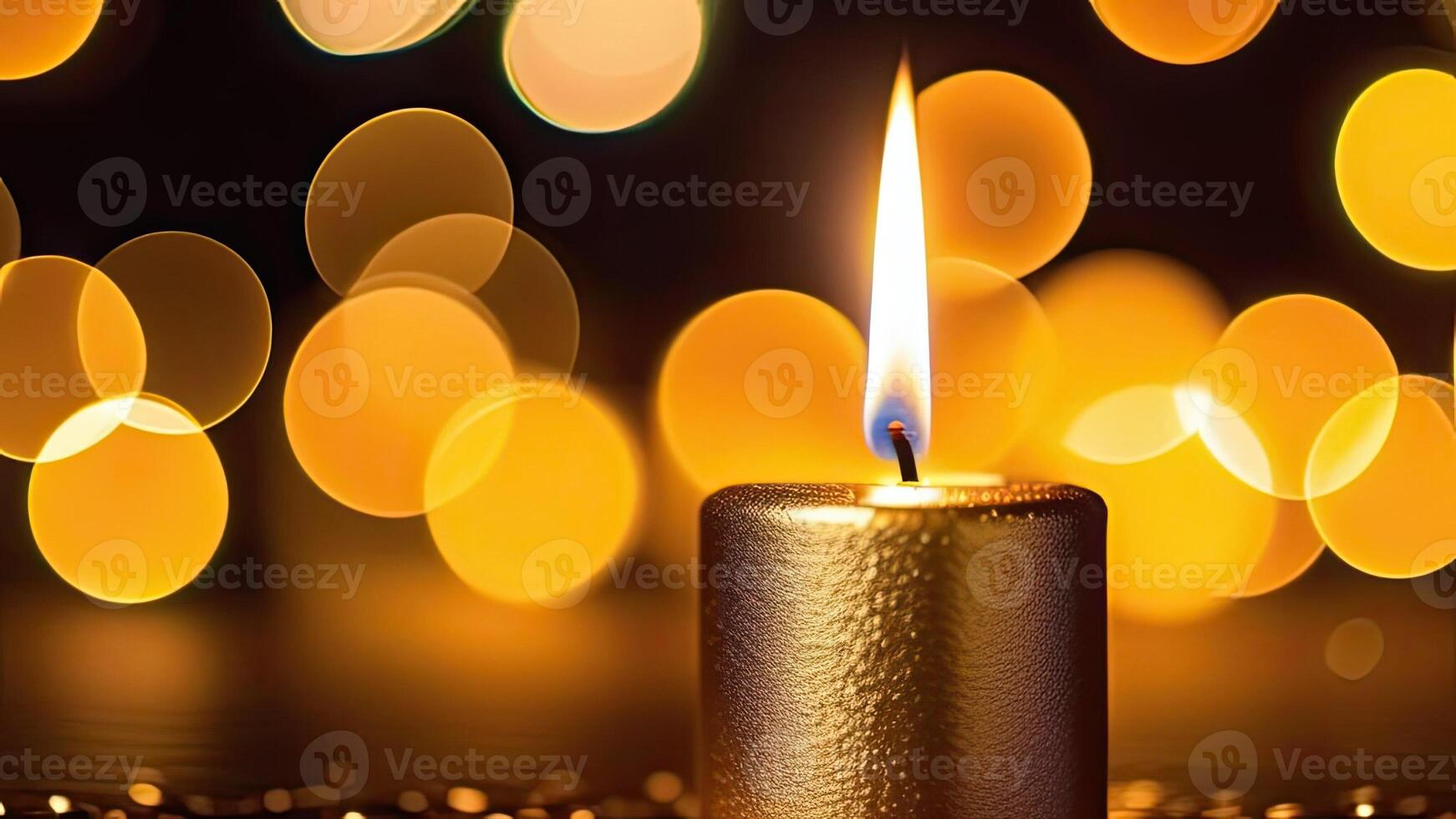 Golden luxury magical beautifully decorated candle burning with a soft flickering flame against an ogee bokeh background in a warm, cozy holiday setting, home decor. photo