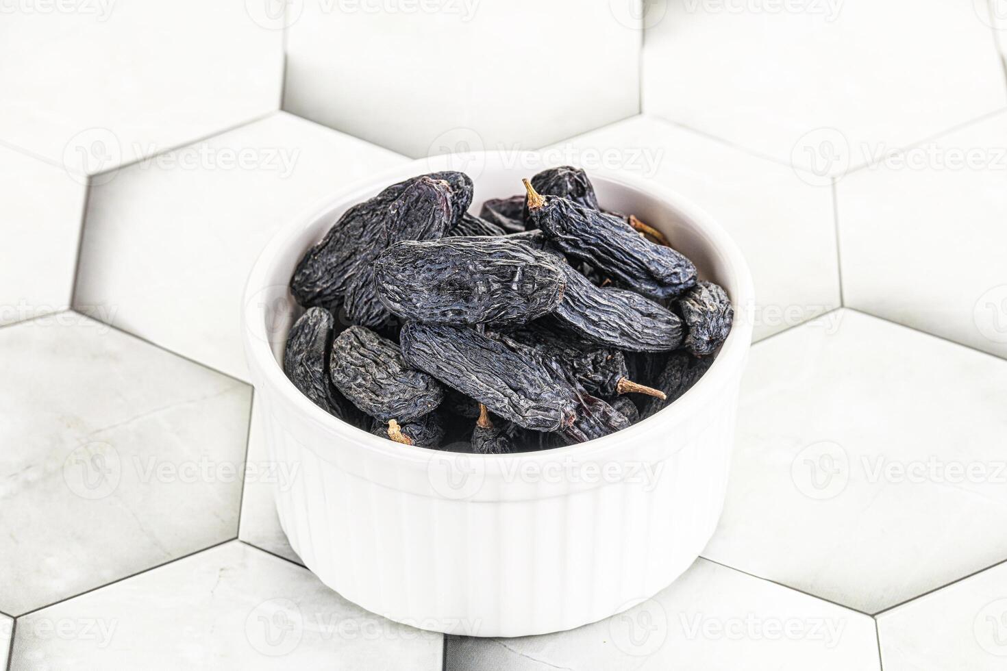 Blue raisin - dry grape berries photo