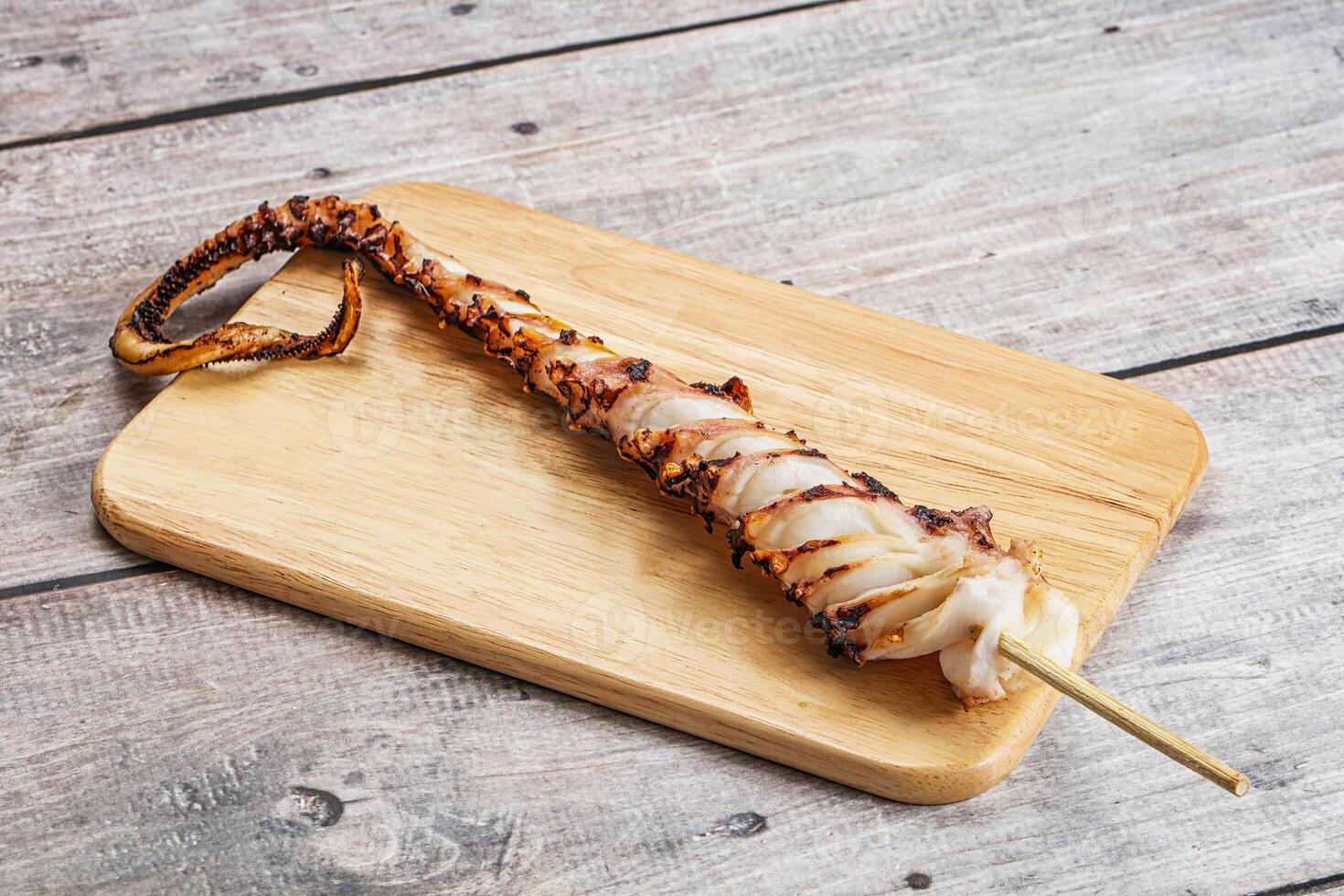 Delicous tasty Grilled octopus tentacle photo