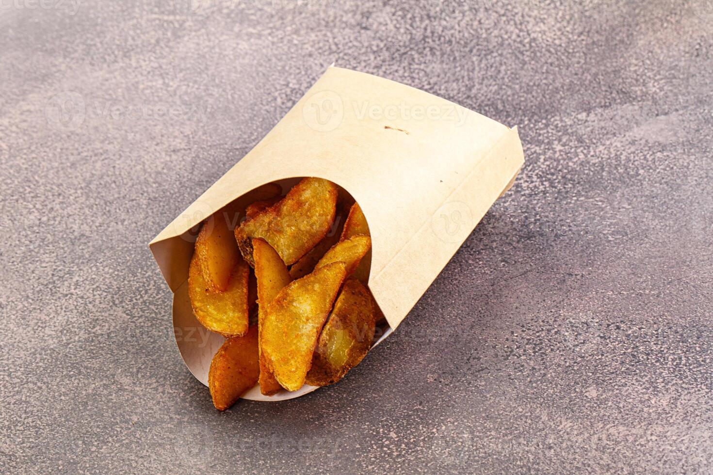 Fried rustic golden potato heap photo