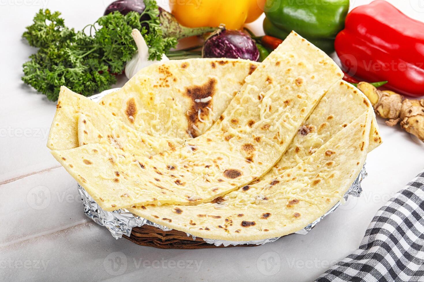 Indian bread cheese garlic naan photo
