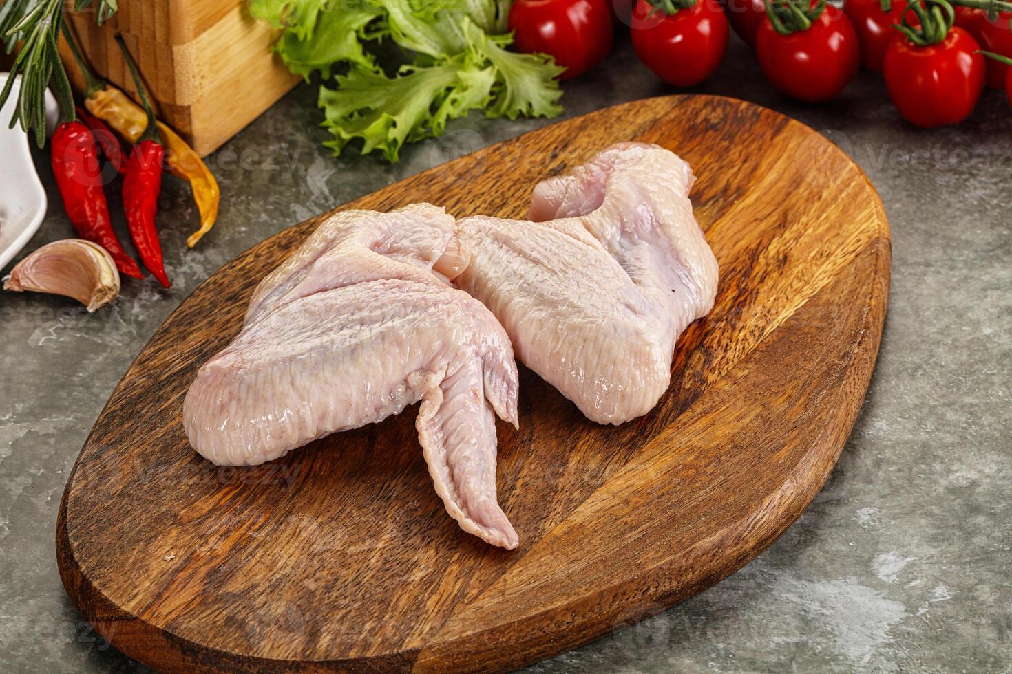 Raw chicken wings foe cooking photo