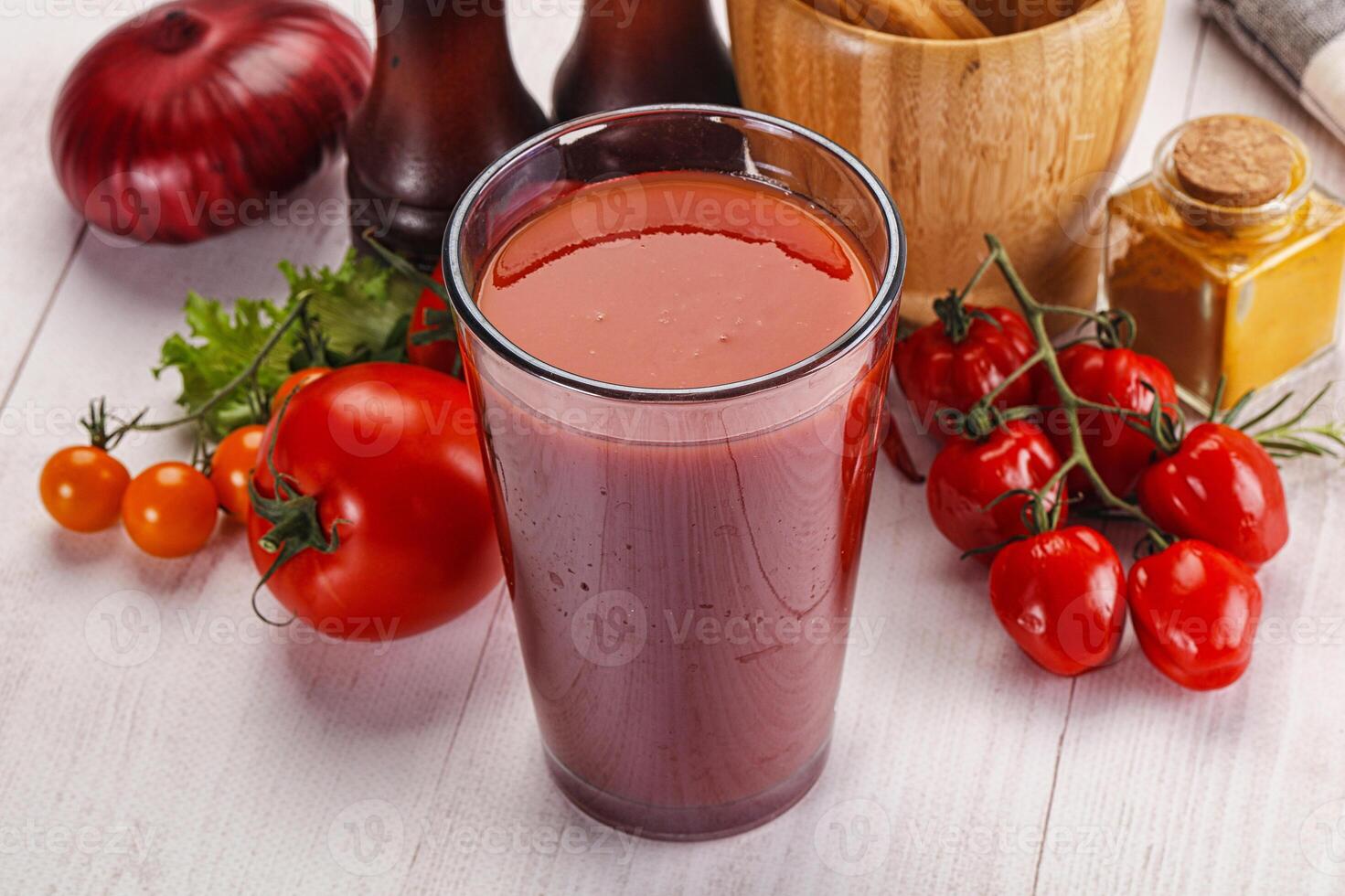 Fresh Tomato juice in the glass photo