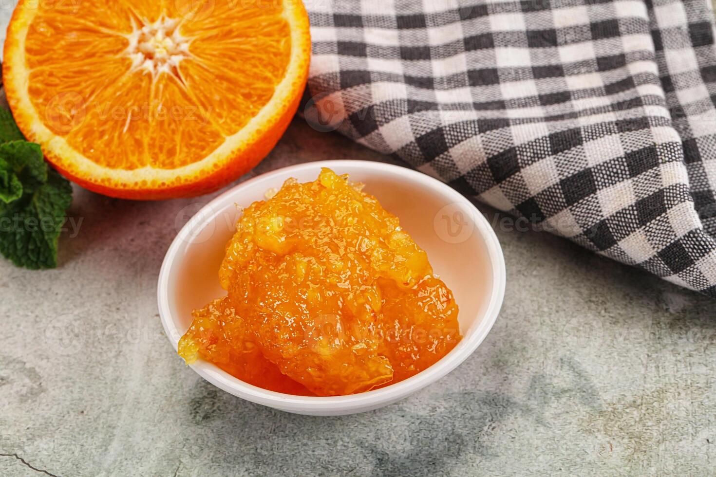 Tasty homemade Orange jam in the bowl photo