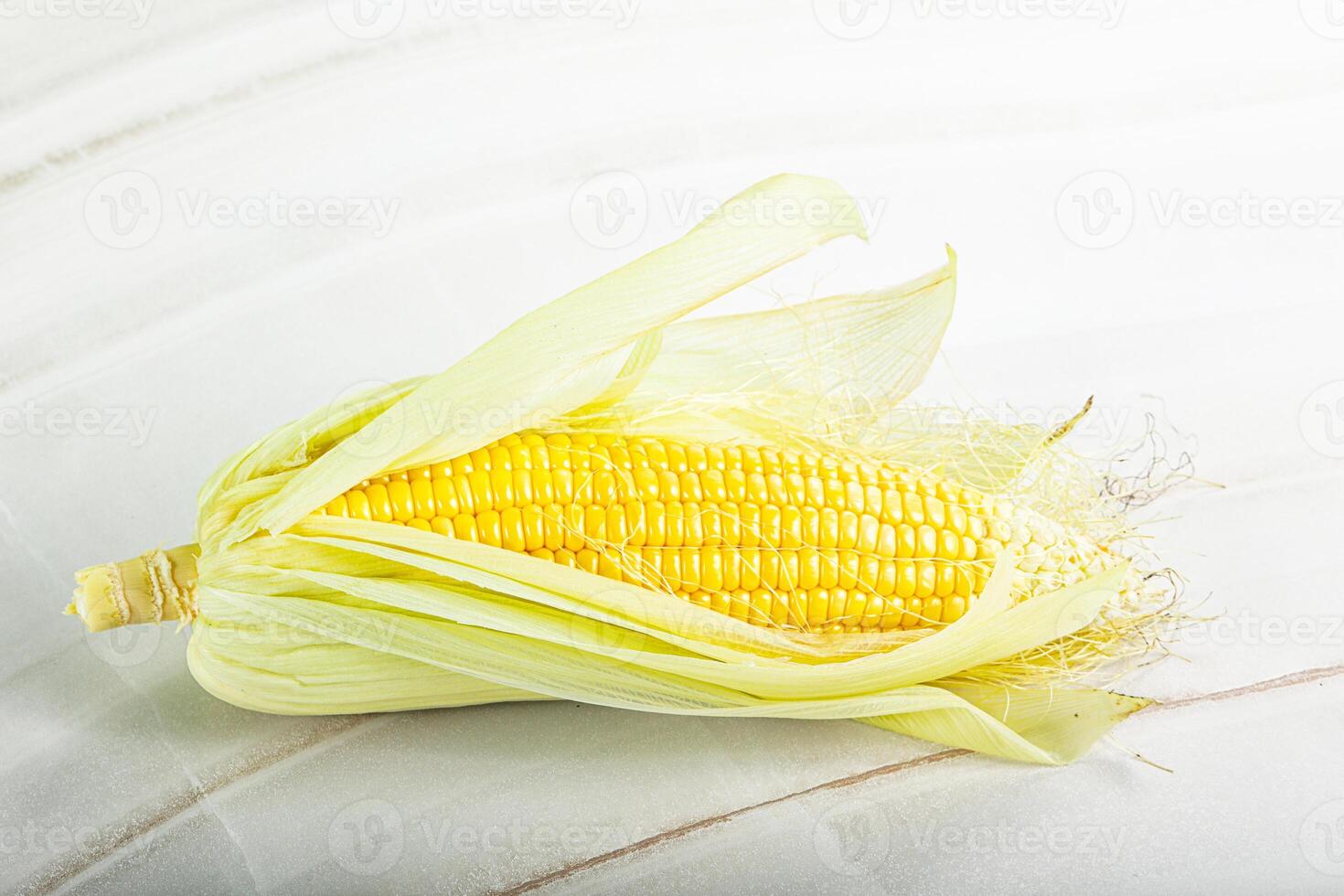 Raw sweet ripe yellow Corn photo