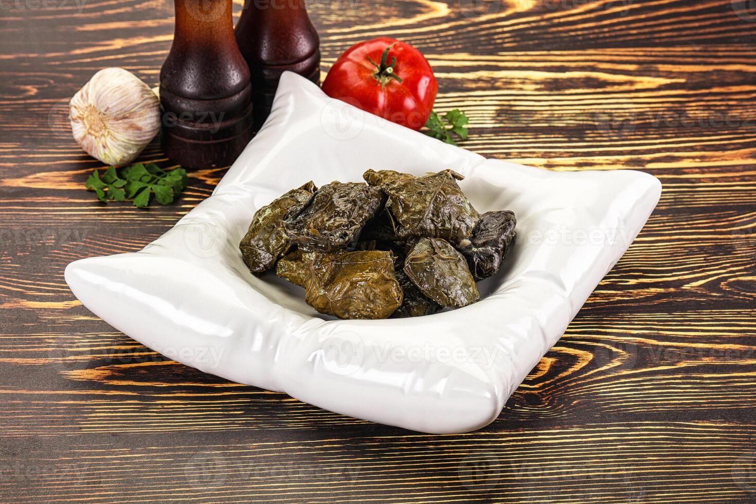Stuffed dolma - meat in grape leaves photo