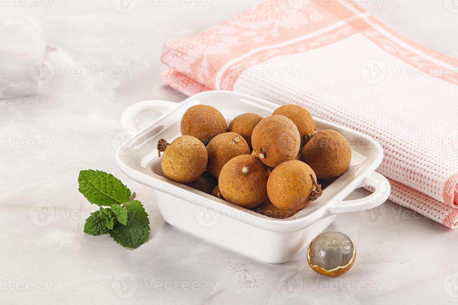 Tropical delicous fruit Longan heap photo
