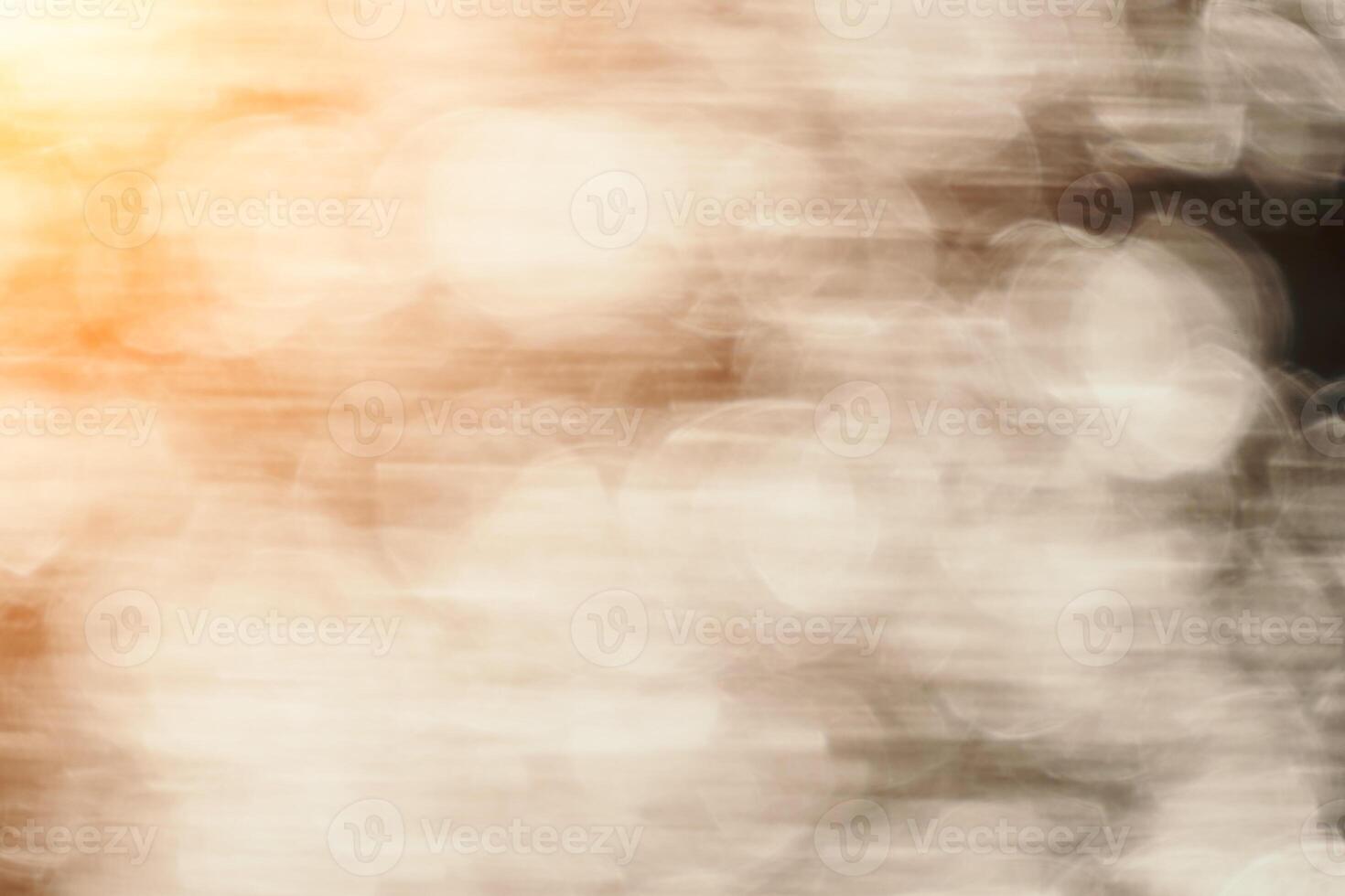 Blurred golden sea at sunset. The sun reflects and sparkles on the waves with bokeh, illuminating the golden sea. Holiday recreation concept. Abstract nautical summer ocean sunset nature background. photo
