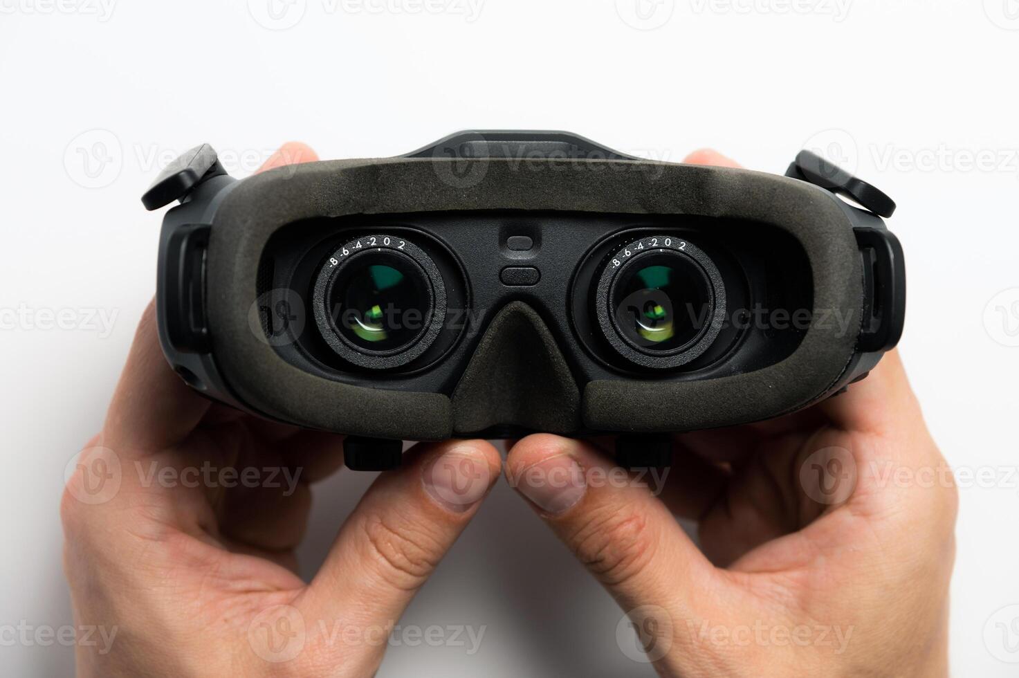 Black fpv or virtual reality glasses with lenses, on a white background. Close-up view from inside photo