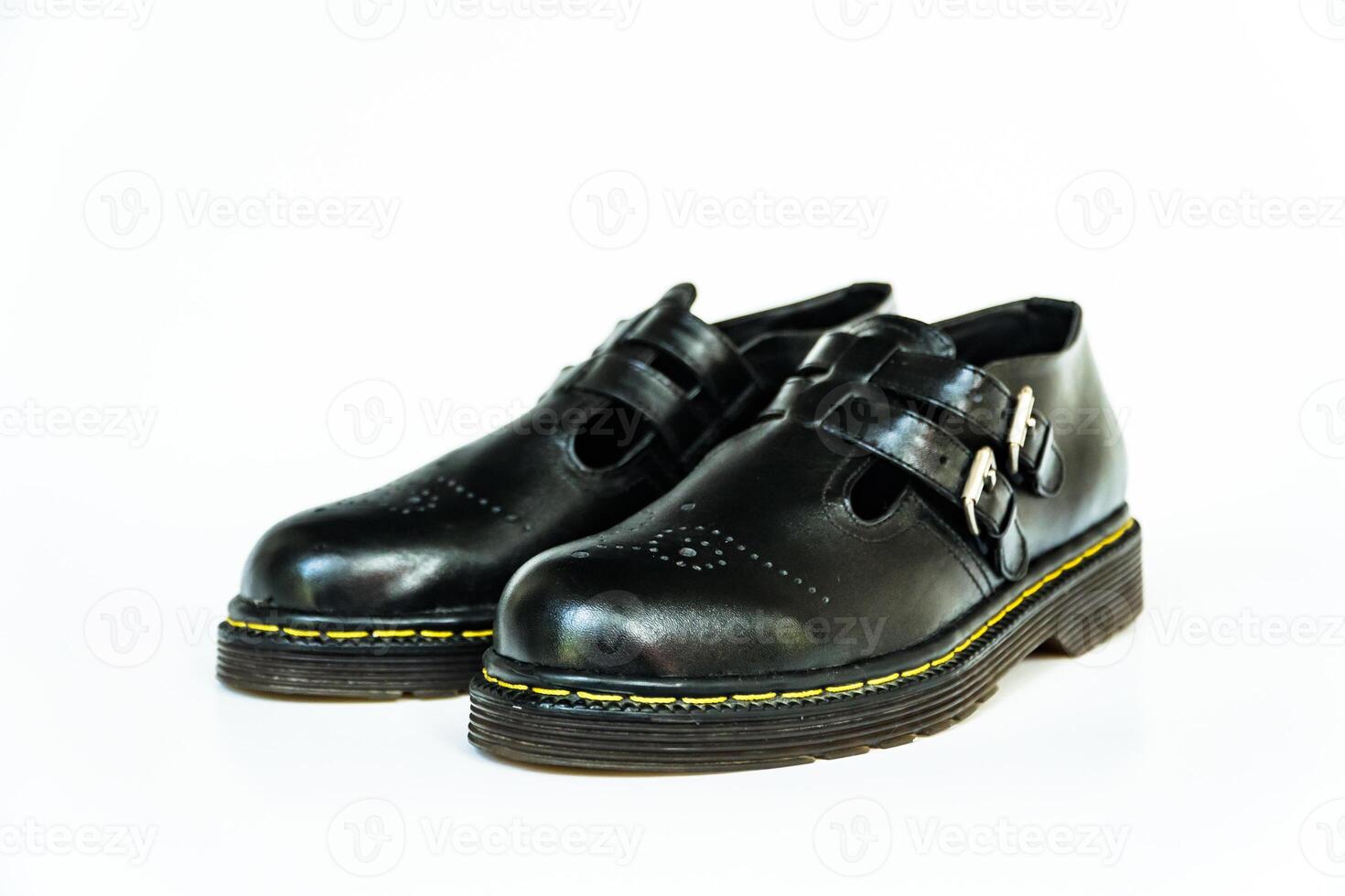 Vintage Mary Jane Rockabilly shoes in full black with rubber outsole made from genuine cowhide. Handmade shoes with neat details, very elegant and shiny on a white background photo