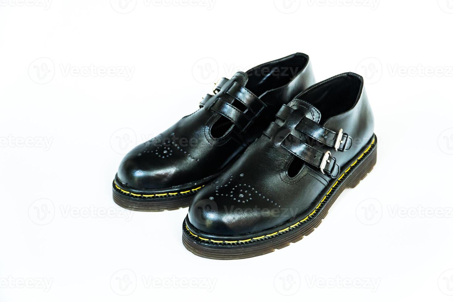 Vintage Mary Jane Rockabilly shoes in full black with rubber outsole made from genuine cowhide. Handmade shoes with neat details, very elegant and shiny on a white background photo