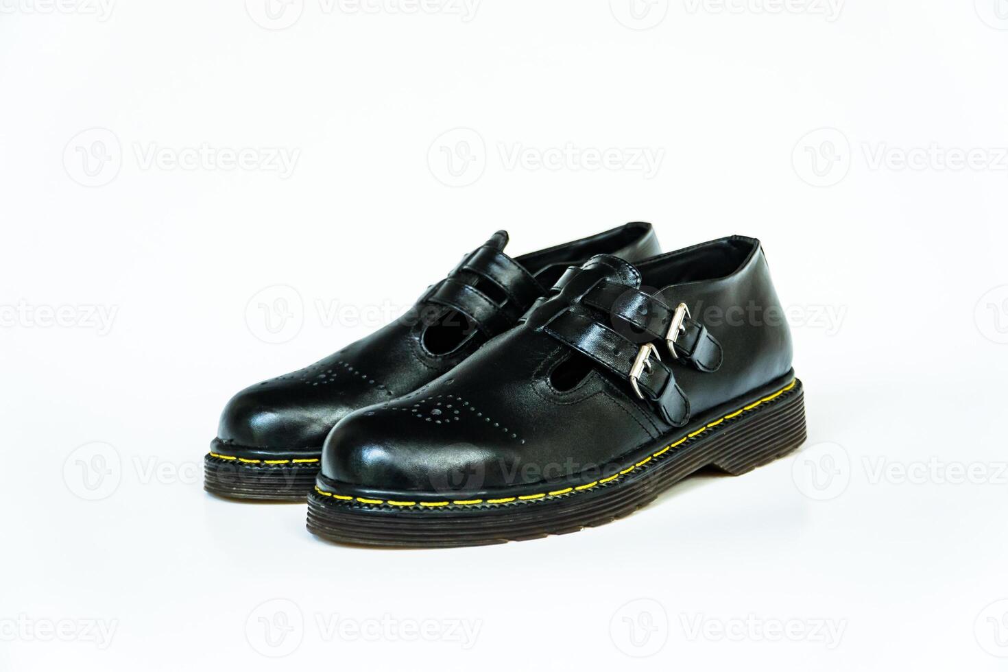Vintage Mary Jane Rockabilly shoes in full black with rubber outsole made from genuine cowhide. Handmade shoes with neat details, very elegant and shiny on a white background photo
