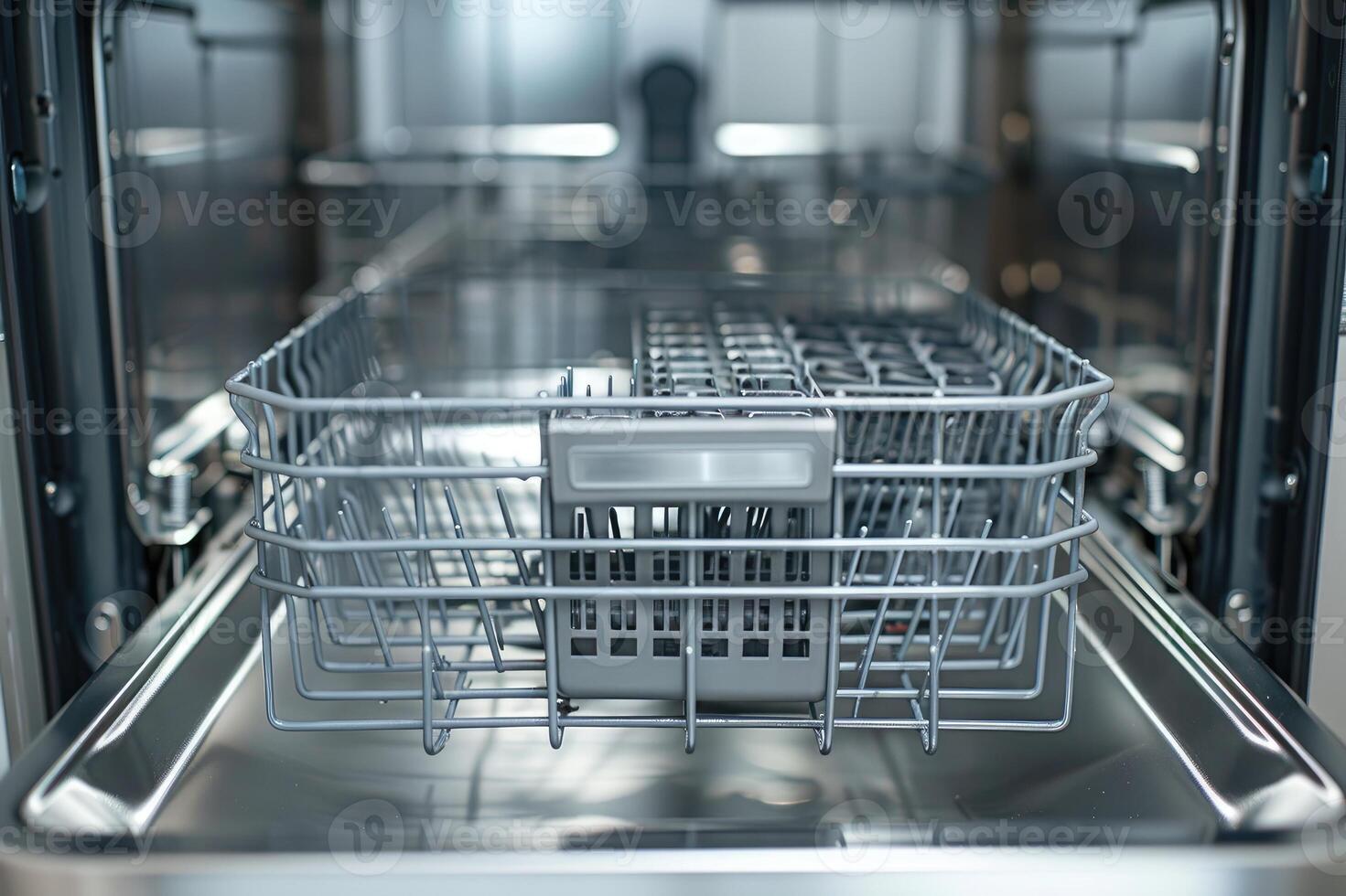 Clean empty stainless-steel dishwasher interior view. photo