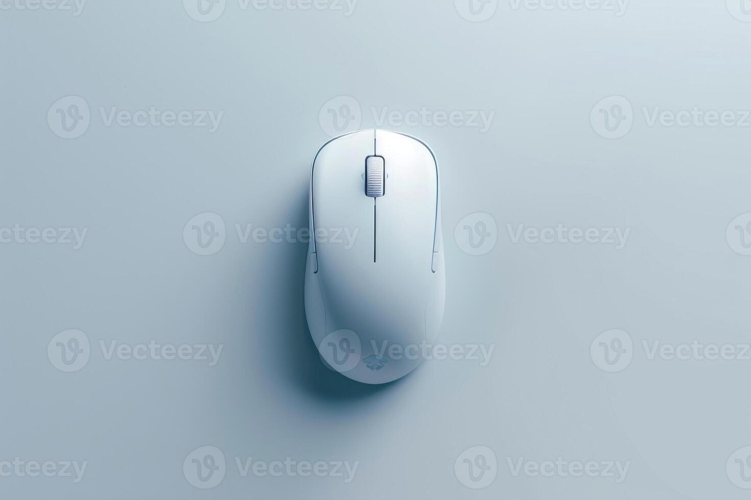 Image of a sleek, white mouse placed centrally on a minimalist grey surface. The design emphasizes simplicity and functionality, appealing to modern aesthetics. photo