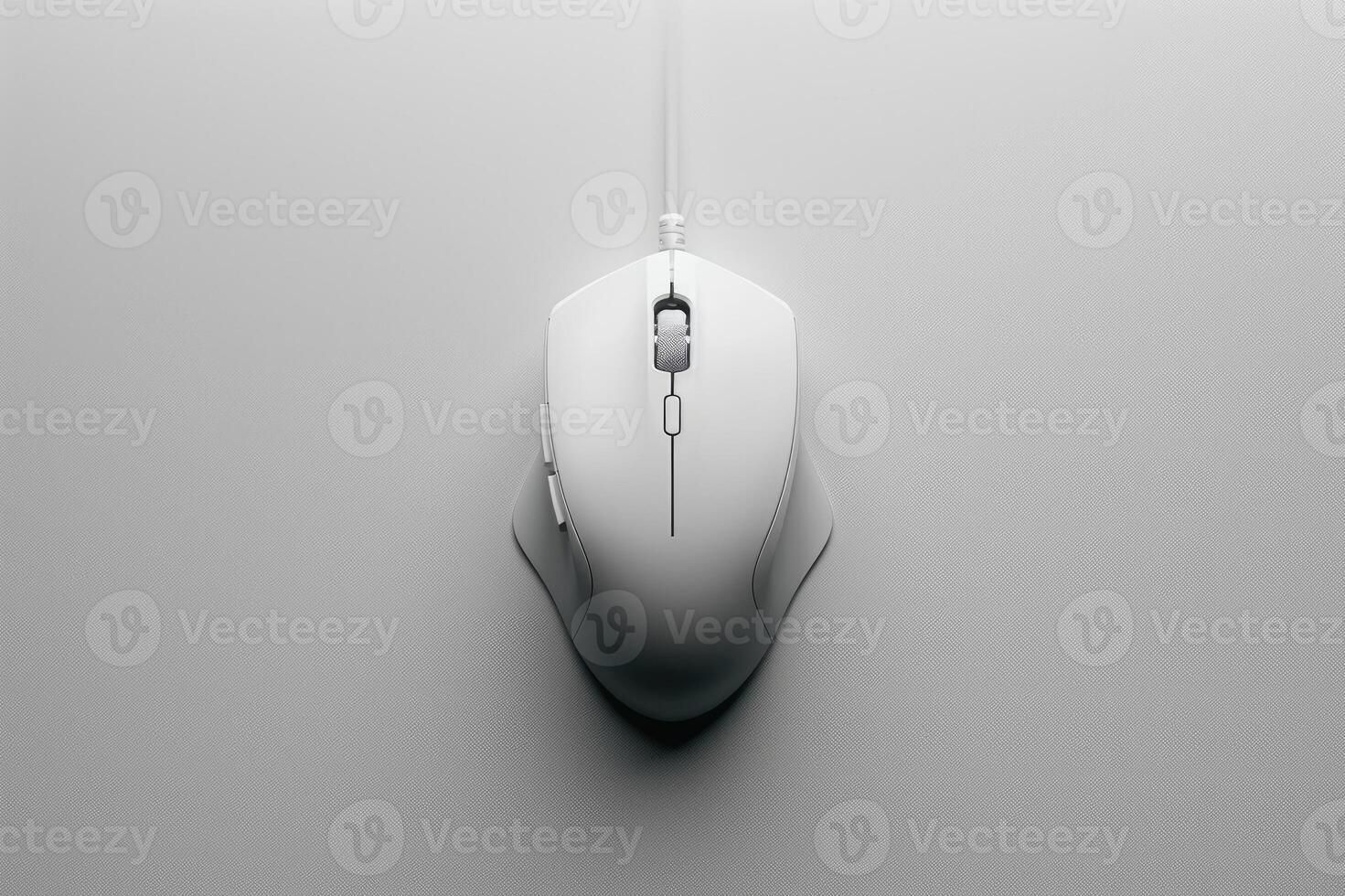 Image of a sleek, white mouse placed centrally on a minimalist grey surface. The design emphasizes simplicity and functionality, appealing to modern aesthetics. photo