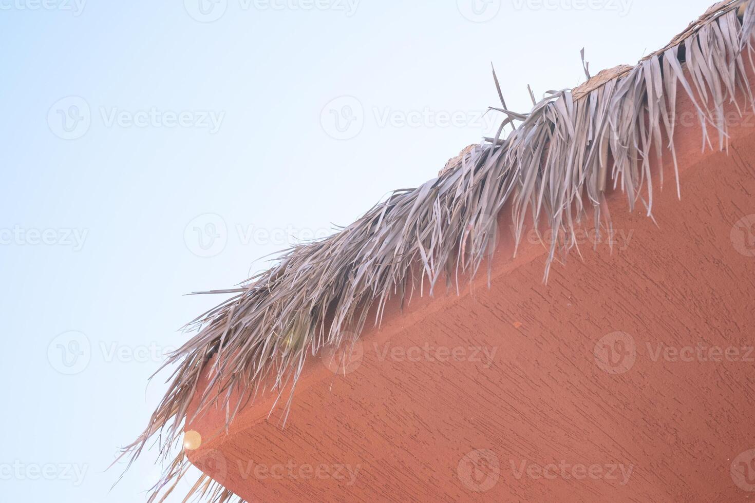 terracotta house with shadow overlay photo
