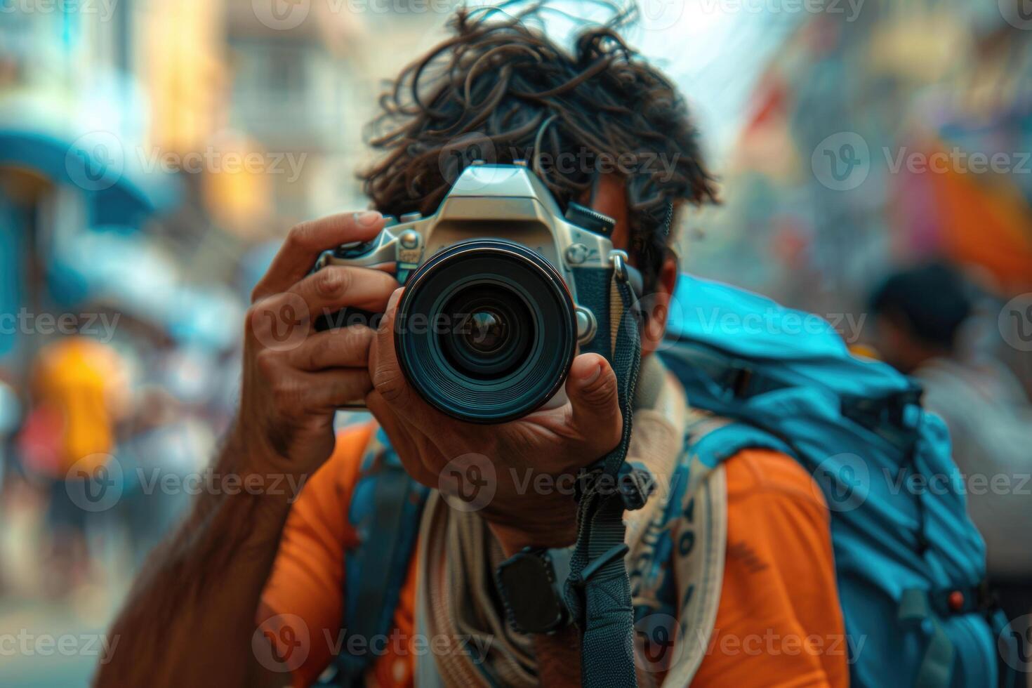 man hand holding camera looking through lens. photo