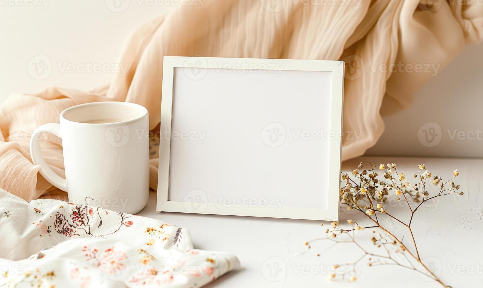 White blank card in a ceramic white frame on a pastel ivory table photo