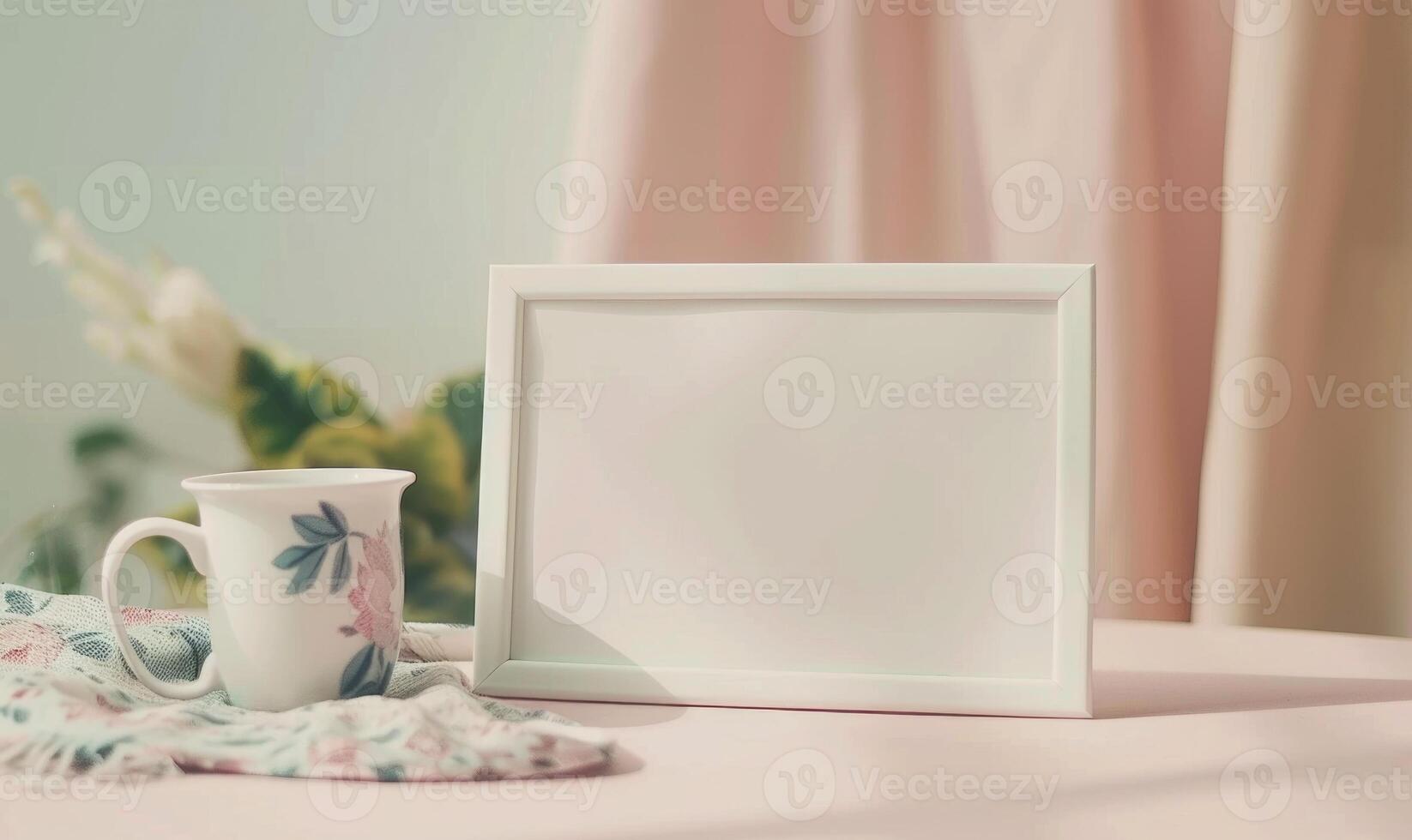 White blank card in a ceramic white frame on a pastel ivory table photo