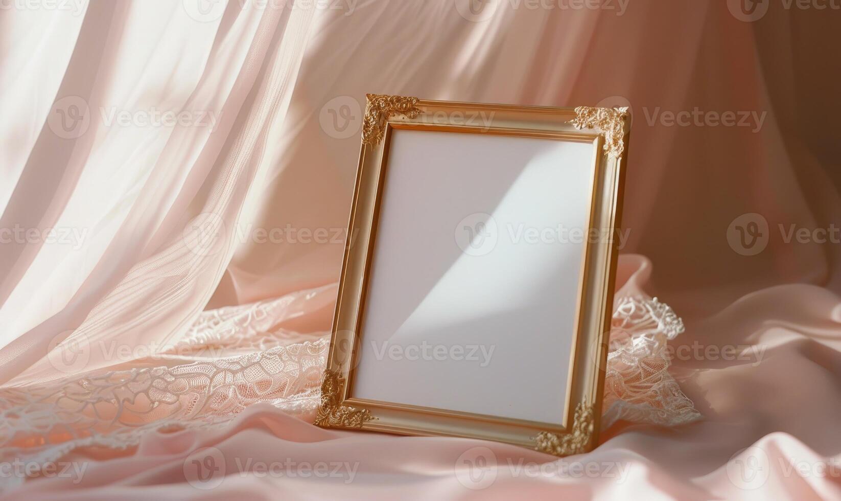 White blank card in an elegant gold frame on a pastel pink table, with a delicate lace cloth, soft lighting photo