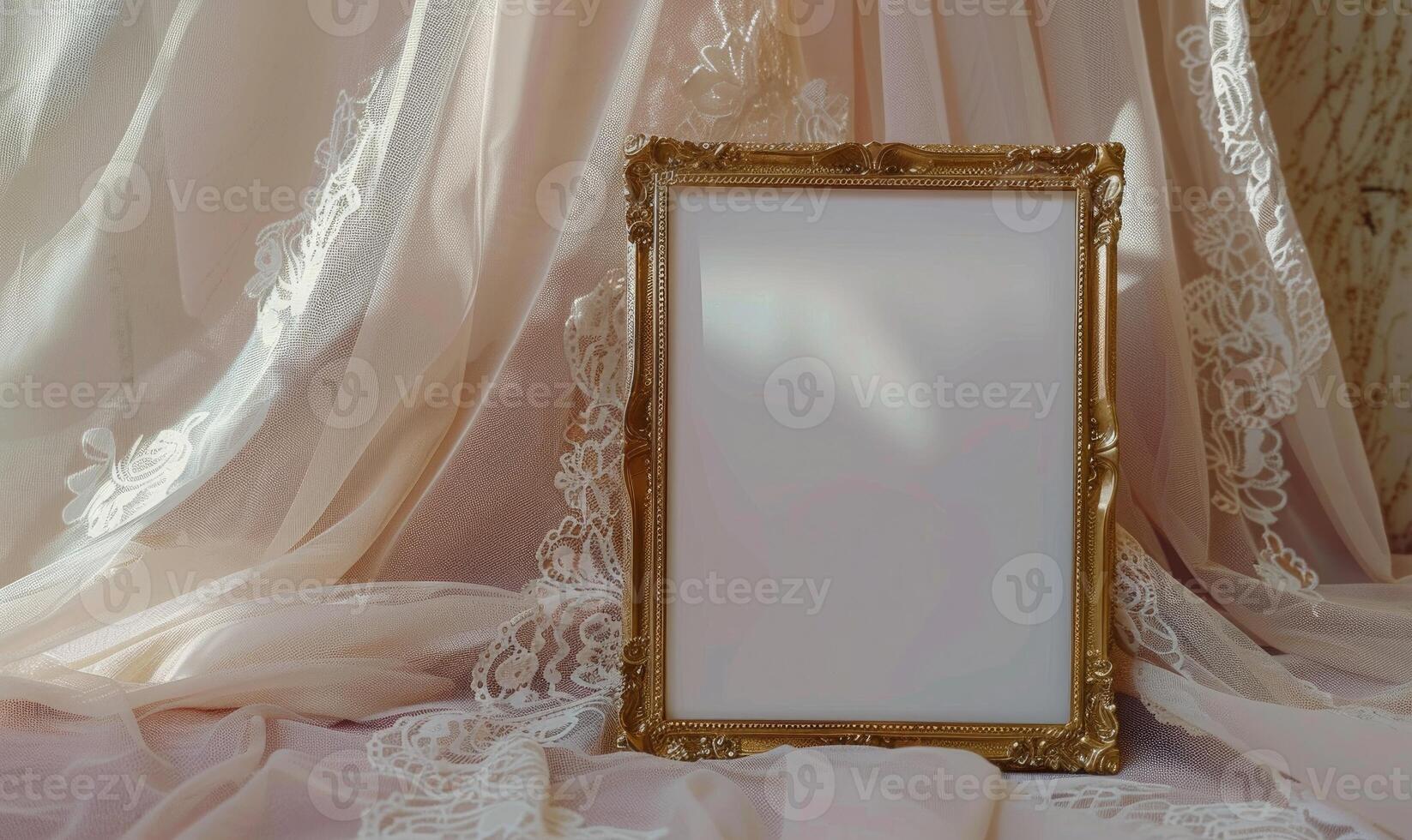 White blank card in an elegant gold frame on a pastel pink table, with a delicate lace cloth, soft lighting photo