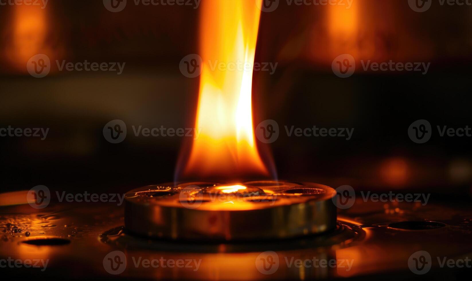 Macro shot of a gas burner emitting a steady flame photo