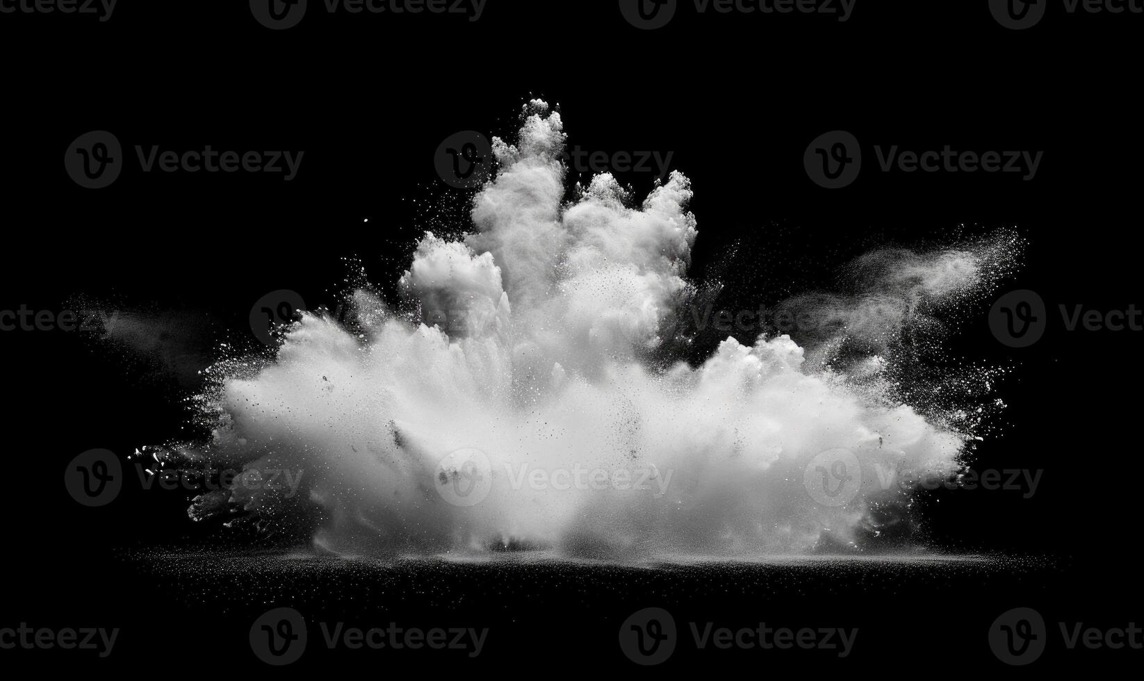 Powder explosion creating a white cloud on black background photo