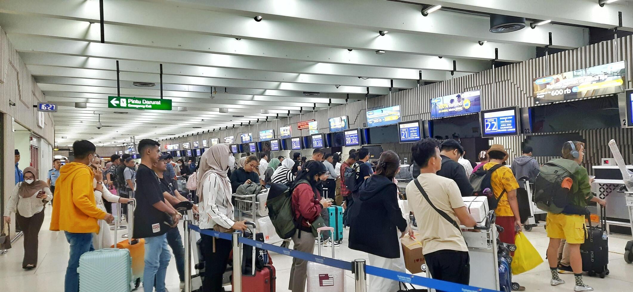 View of passengers activity and interior at terminal 1A Soekarno-Hatta International airport Jakarta, Indonesia - June 11 2024 photo